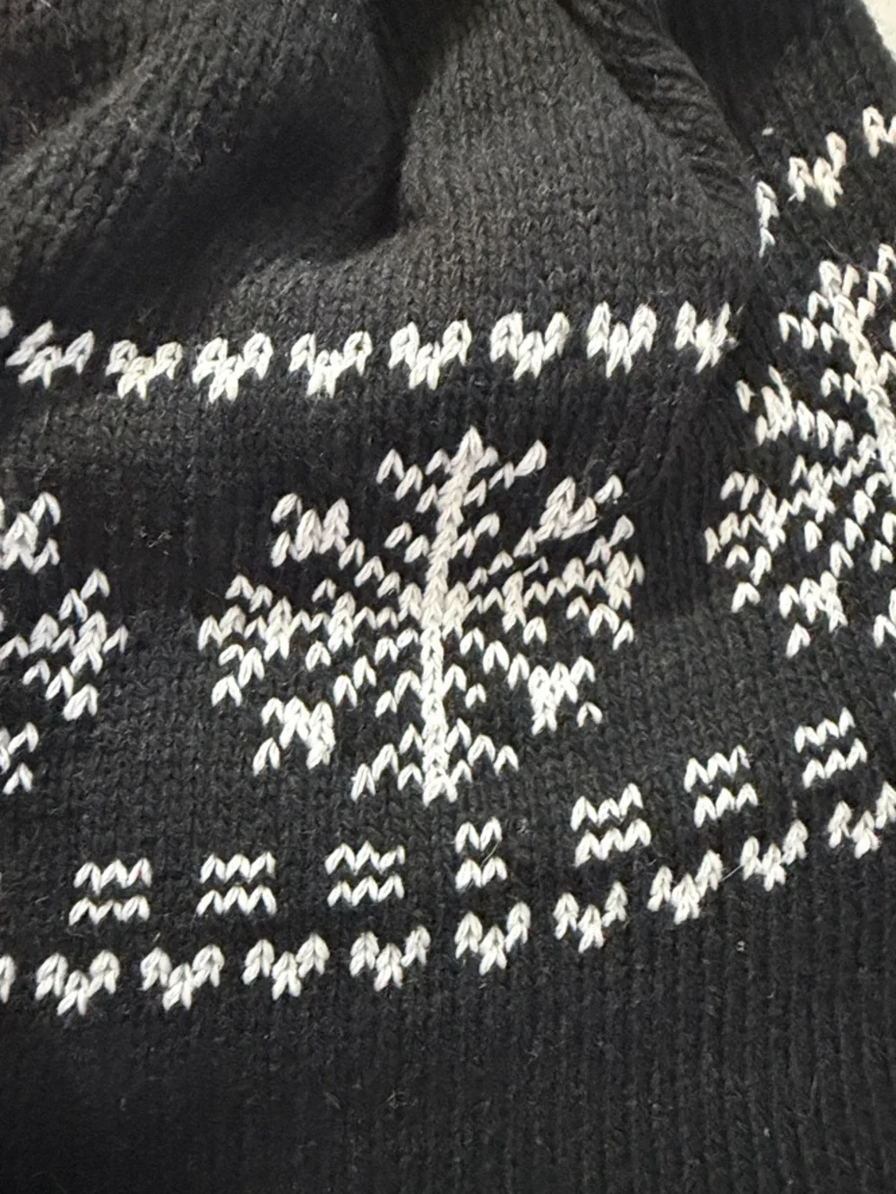 Black Pom Pom Knit Beanie with White Snowflake Pattern